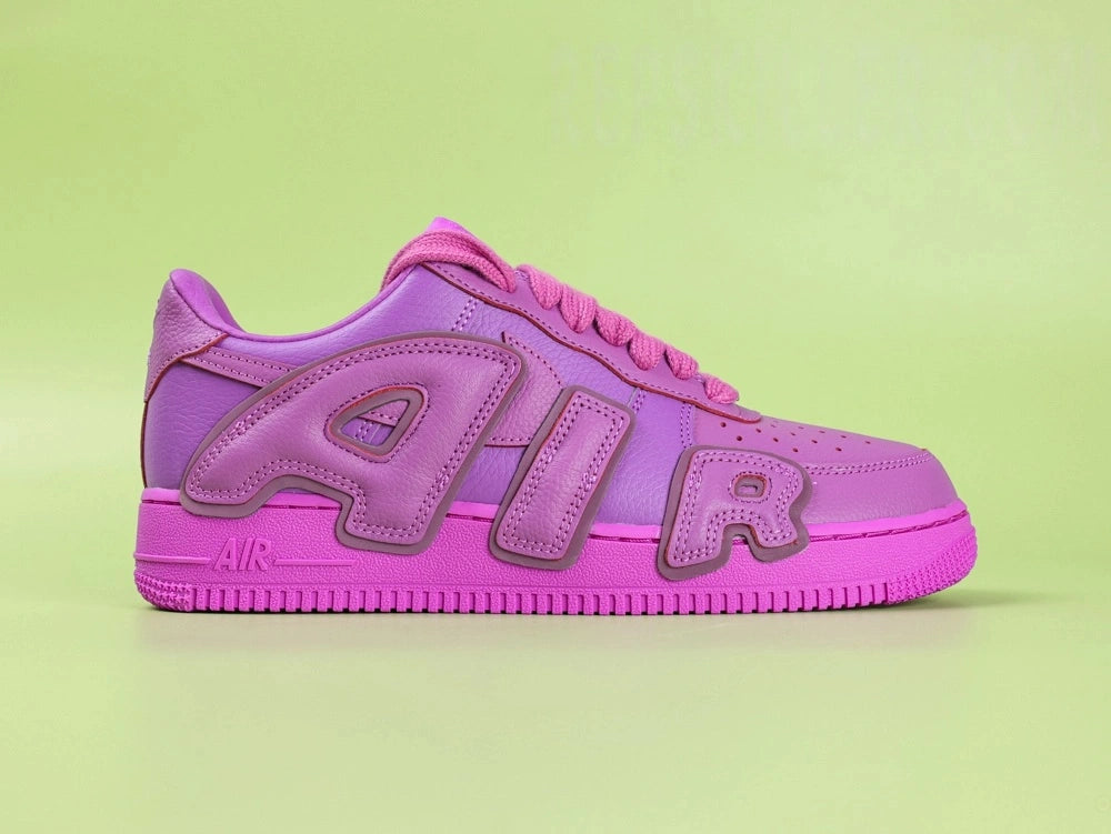 Nike x CPFM Air Force 1 Low Premium Fuchsia Dream - pair three quarter view white background