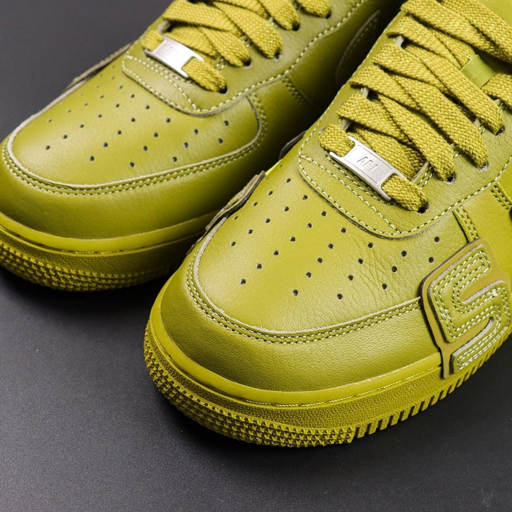 Nike x CPFM Air Force 1 Low Premium Moss - lateral side SUN lettering medial AIR pair