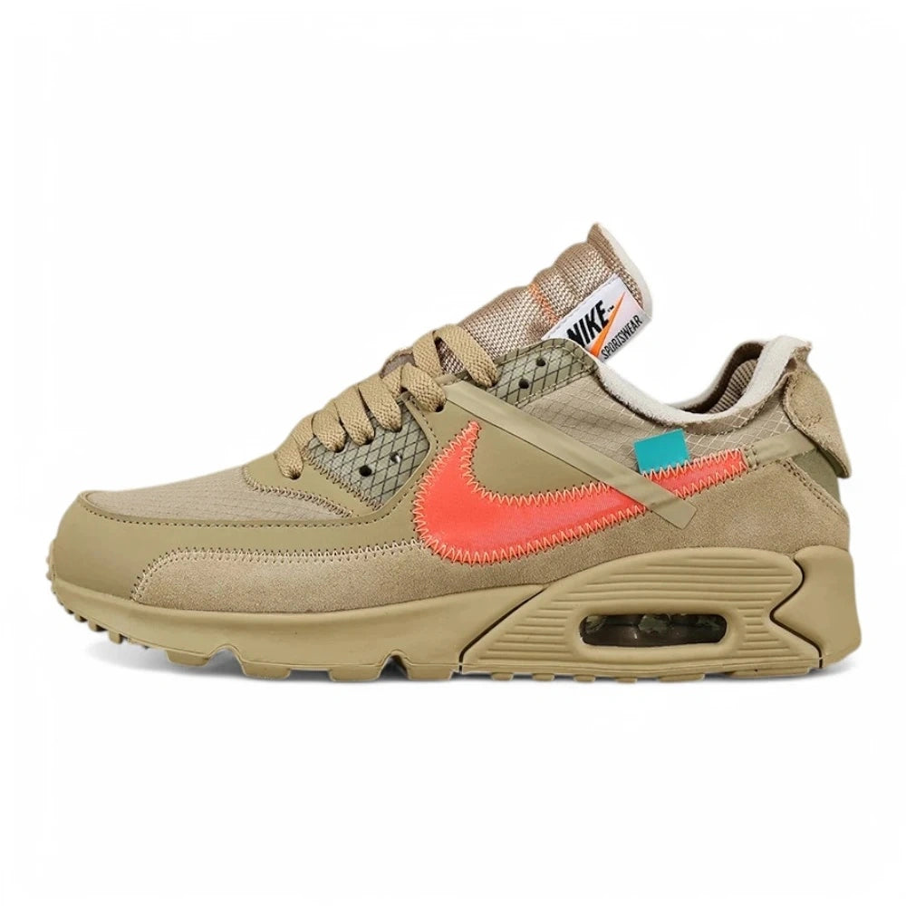 Off-White x Air Max 90 Desert Ore - Full Lateral Profile View on Olive Background Showing Sand Ripstop Mesh Upper Sand Suede Overlays Hot Coral Raw-Edge Swoosh with Coral Overlock Stitching and Teal Zip-Tie on Lateral Heel