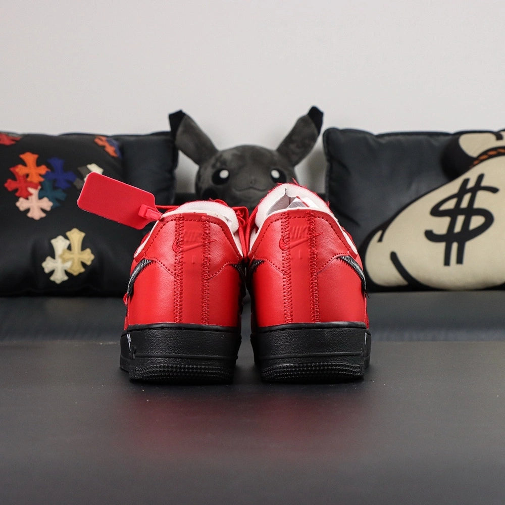 Off-White x Air Force 1 Low SP Red Black - pair three quarter view with orange Off-White box