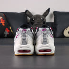 SB x Air Max 95 Cactus Flower - Lateral Profile and Outsole View on Dark Background Showing White Grey Gradient AM95 Upper Fuchsia Grosgrain Lace Tabs Fuchsia Air Units and Full Honey Gum AM95 Square-Block Waffle Outsole