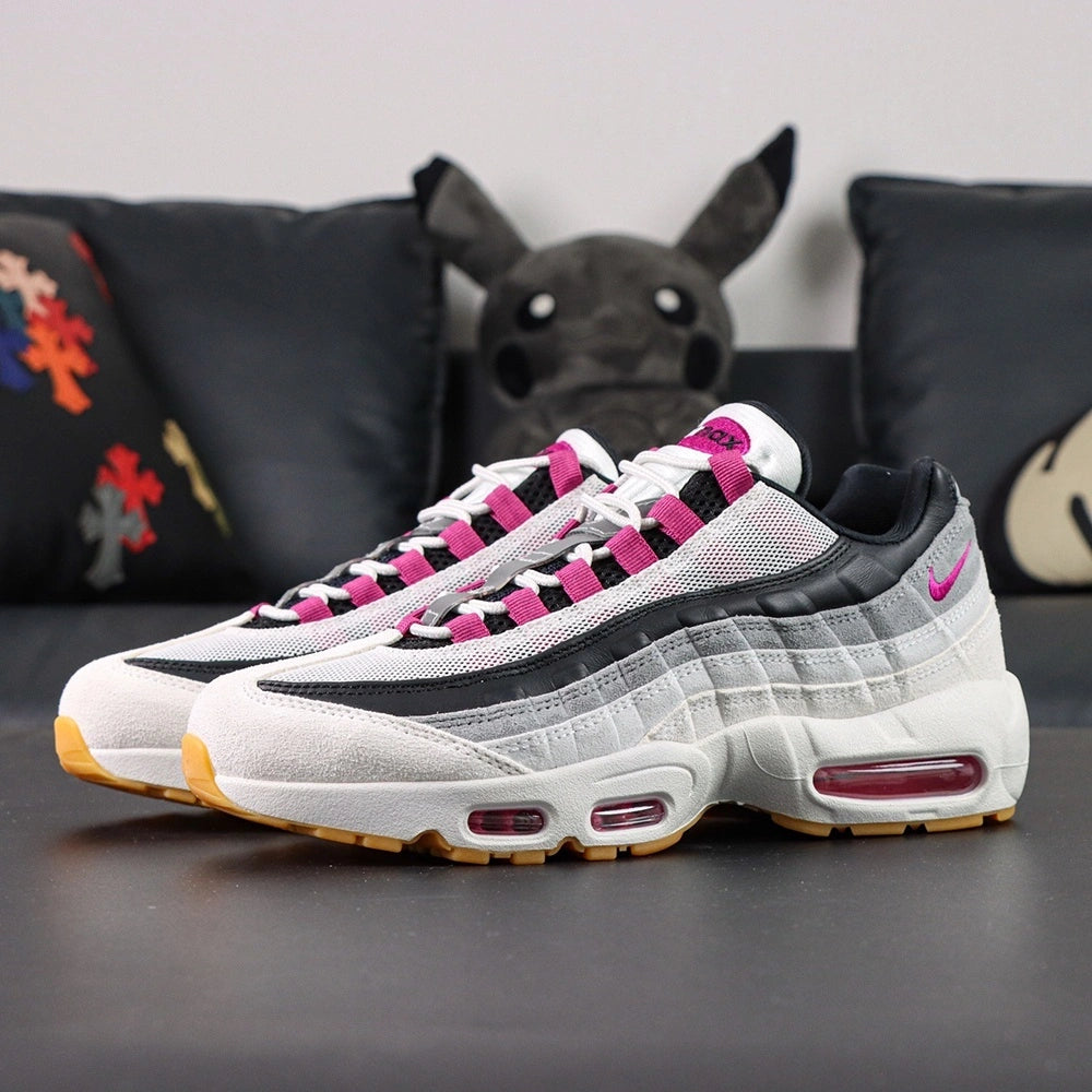 SB x Air Max 95 Cactus Flower - Lateral Profile View with Purple Shoebox on Dark Background Showing Full White Grey Black AM95 Upper Cactus Flower Fuchsia Grosgrain Lace Tabs and Honey Gum Outsole
