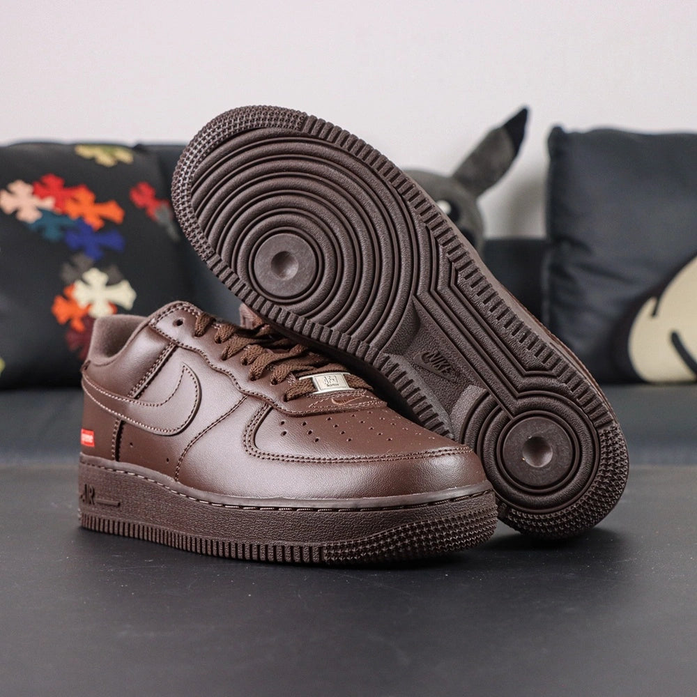 Supreme x Air Force 1 Low Box Logo Baroque Brown - pair overhead flat lay black background Supreme badge
