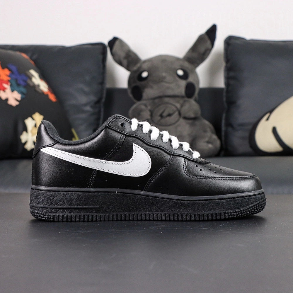Supreme x Air Force 1 Low Box Logo Black White White Laces - pair three quarter view Pikachu lifestyle