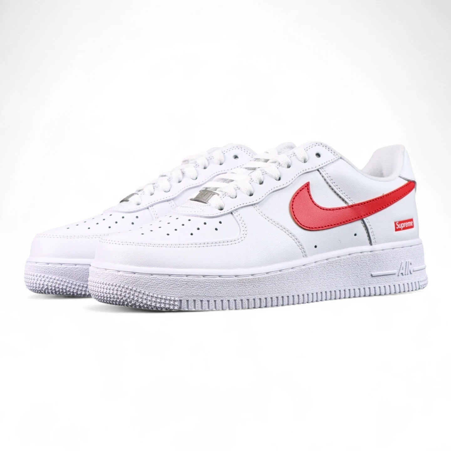 Supreme x Air Force 1 Low Box Logo Speed Red - pair three quarter front view white leather red Swoosh Pikachu
