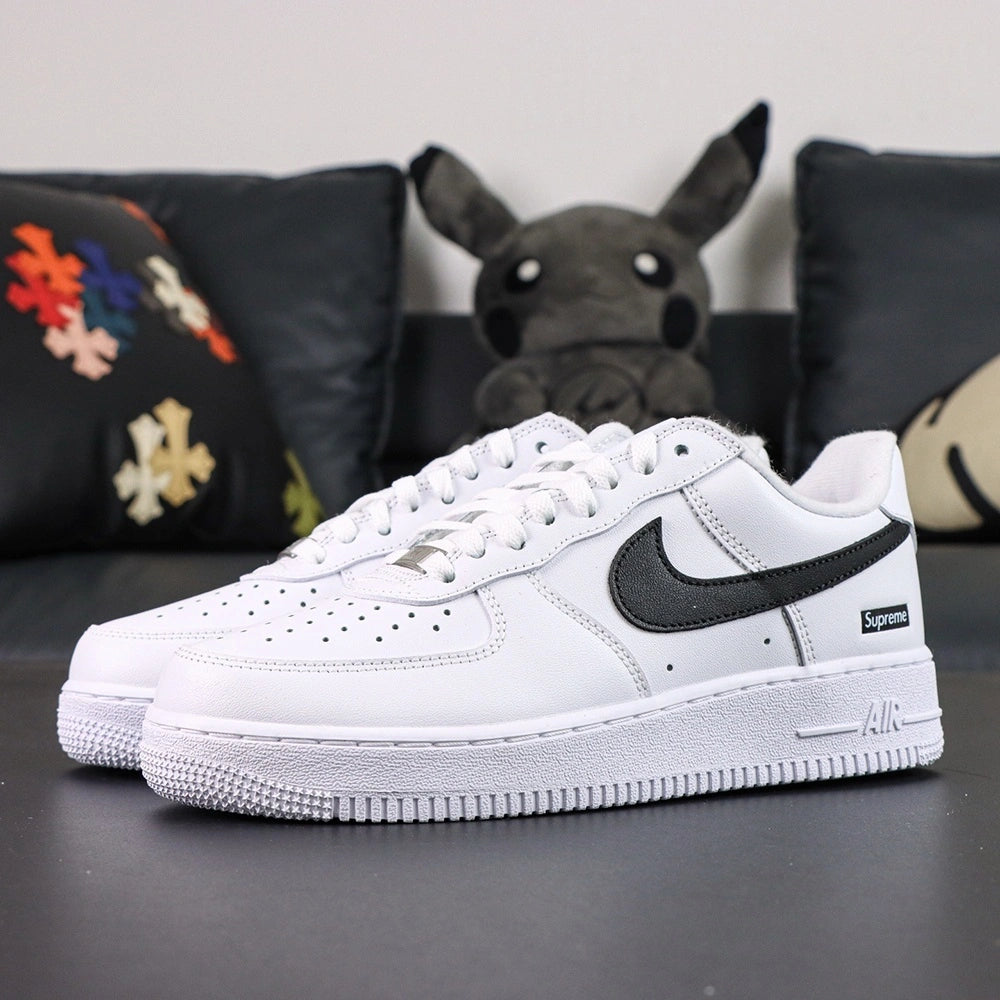 Supreme x Air Force 1 Low Box Logo White Black - single shoe lateral profile black Swoosh Supreme metal badge Pikachu
