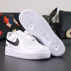 Supreme x Air Force 1 Low Box Logo White Black - pair three quarter rear view white outsole black Swoosh Pikachu