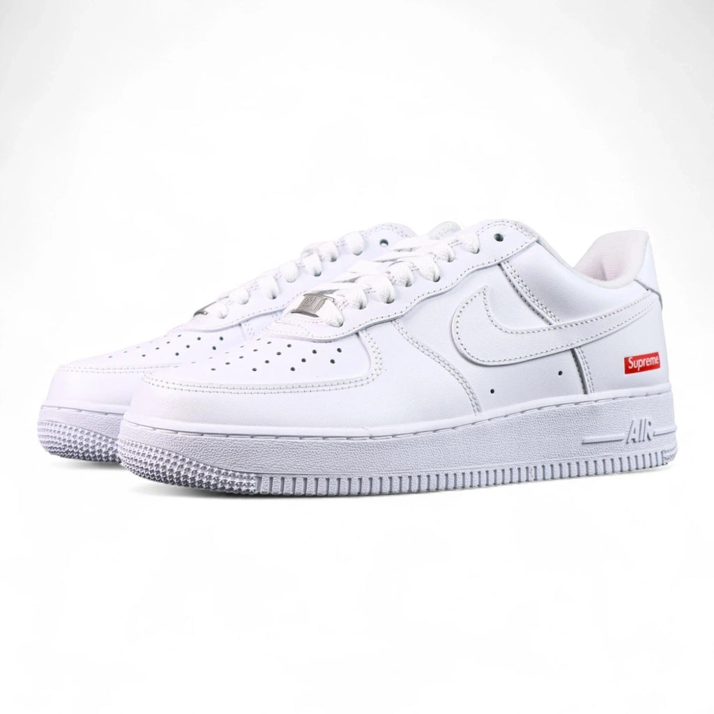 Supreme x Air Force 1 Low Box Logo White - pair three quarter front view triple white tonal Swoosh Pikachu