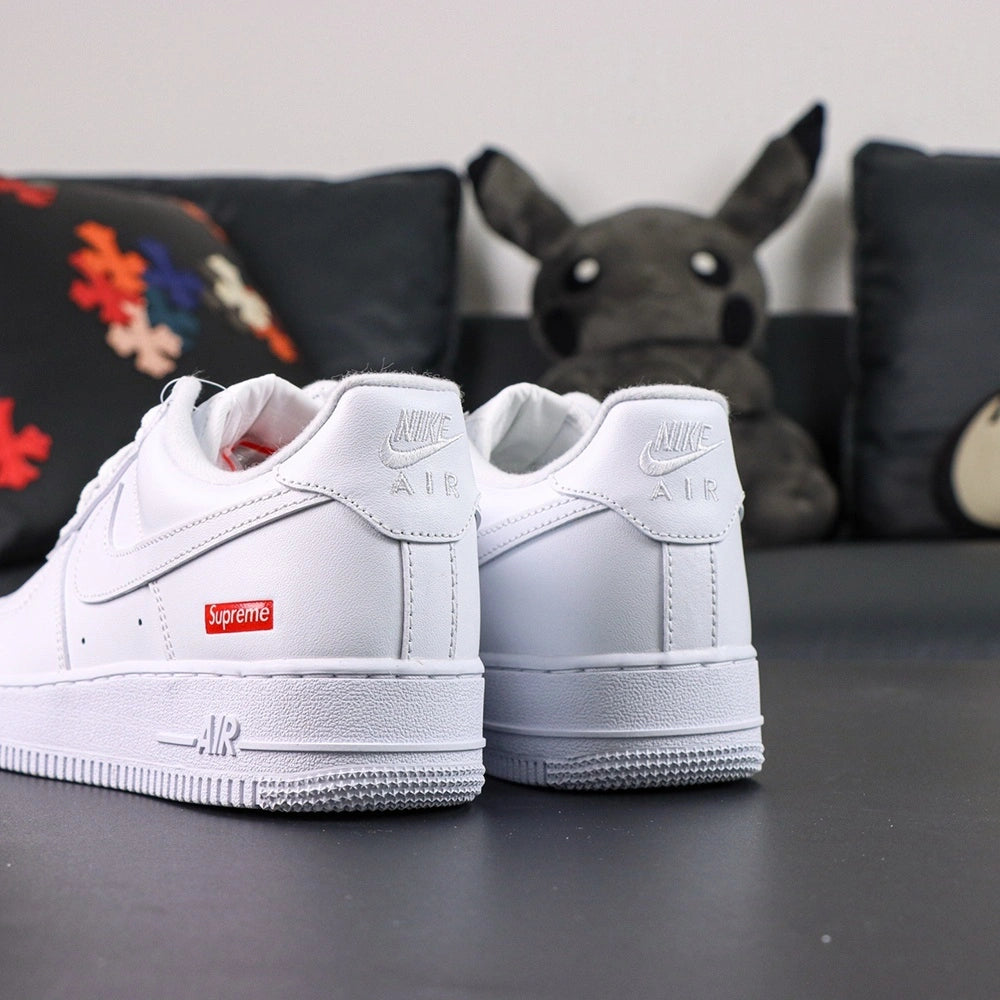 Supreme x Air Force 1 Low Box Logo White - full white outsole bottom and lateral Supreme badge Pikachu