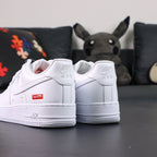 Supreme x Air Force 1 Low Box Logo White - full white outsole bottom and lateral Supreme badge Pikachu