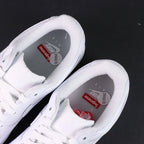 Supreme x Air Force 1 Low Box Logo White - single shoe lateral profile tonal white Swoosh red Supreme badge Pikachu
