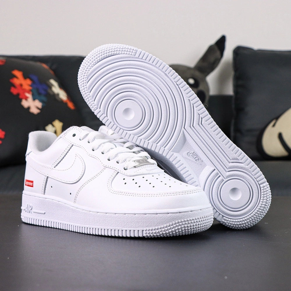 Supreme x Air Force 1 Low Box Logo White - pair three quarter view AIR midsole red Supreme badge Pikachu