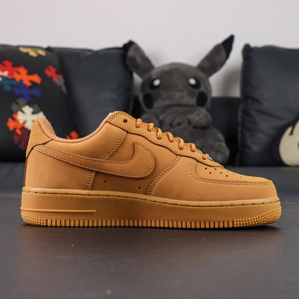 Supreme x Air Force 1 Low SP Box Logo Wheat - pair three quarter view Pikachu lifestyle wheat gum sole