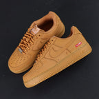 Supreme x Air Force 1 Low SP Box Logo Wheat - pair three quarter view lateral red Supreme badge wheat gum sole Pikachu