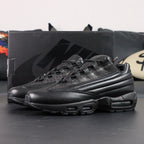 Supreme x Air Max 95 Lux Black - Full Lateral Profile View on White Background Showing Complete Triple Black Premium Leather AM95 Lux Construction Debossed Supreme Script and Full Black Midsole Outsole