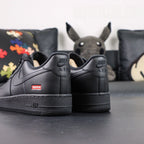Supreme x Air Force 1 Low Box Logo Black - pair three quarter view red Supreme box logo Pikachu
