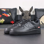 Supreme x Air Force 1 Low Box Logo Black - pair outsole bottom and lateral Supreme box logo Pikachu