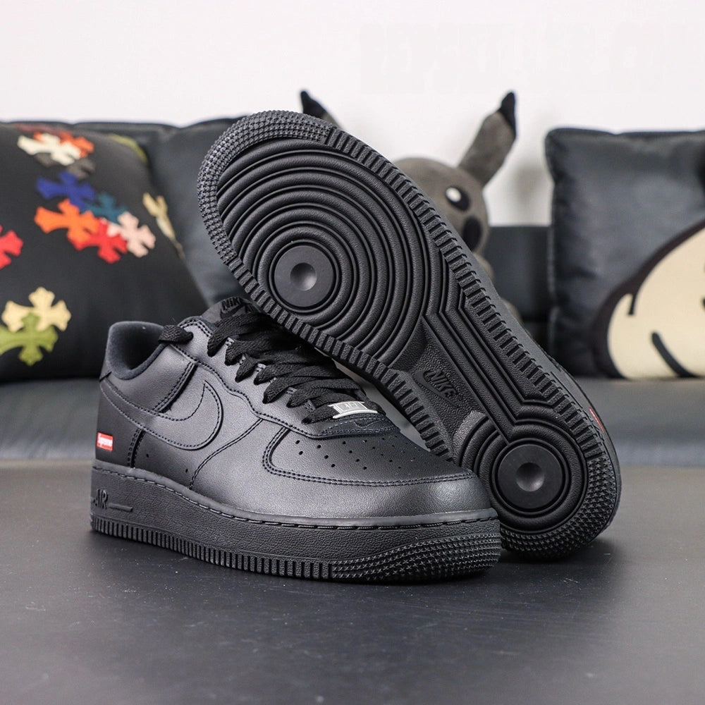Supreme x Air Force 1 Low Box Logo Black - pair three quarter view outsole detail Pikachu lifestyle