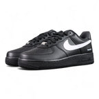 Supreme x Air Force 1 Low Box Logo Black White - pair three quarter rear view black outsole Pikachu