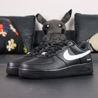 Supreme x Air Force 1 Low Box Logo Black White - pair three quarter front view white Swoosh Pikachu