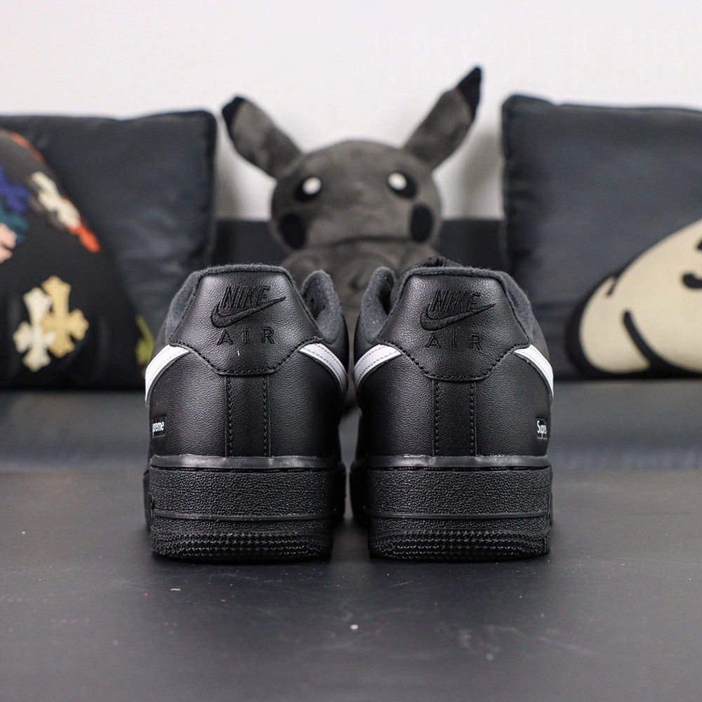 Supreme x Air Force 1 Low Box Logo Black White - lateral side profile white Swoosh Supreme badge Pikachu