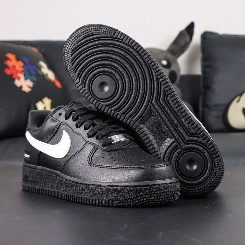 Supreme x Air Force 1 Low Box Logo Black White - pair overhead flat lay Supreme insole red tongue