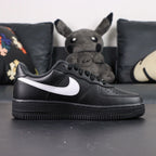 Supreme x Air Force 1 Low Box Logo Black White - pair three quarter view AIR midsole Supreme badge Pikachu