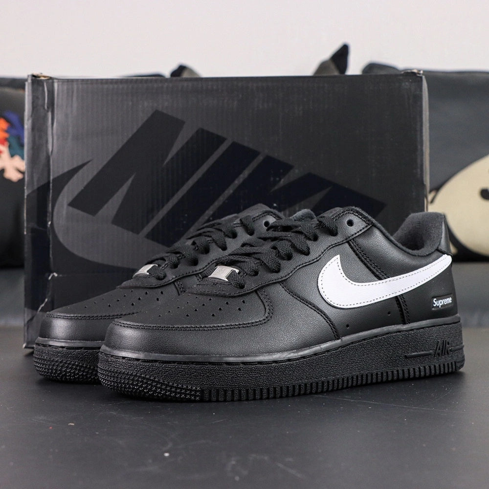 Supreme x Air Force 1 Low Box Logo Black White - pair three quarter view white background clean