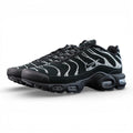 Swarovski x Air Max Plus Moonlight 2024 - Full Lateral Profile View with Black Shoebox on Dark Background Showing Triple Black TN Upper with Full Swarovski Crystal Rhinestone Dot-Matrix Coverage Tracing Wave-Form Divider Lines and Crystal Swoosh