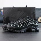 Swarovski x Air Max Plus Moonlight 2024 - Tongue and Ankle Collar Top Down View on Dark Background Showing Black Ankle Collar Soft Textile Lining Yellow Tn AIR Badge and Silver Swoosh Dubrae on Lace Eyelet