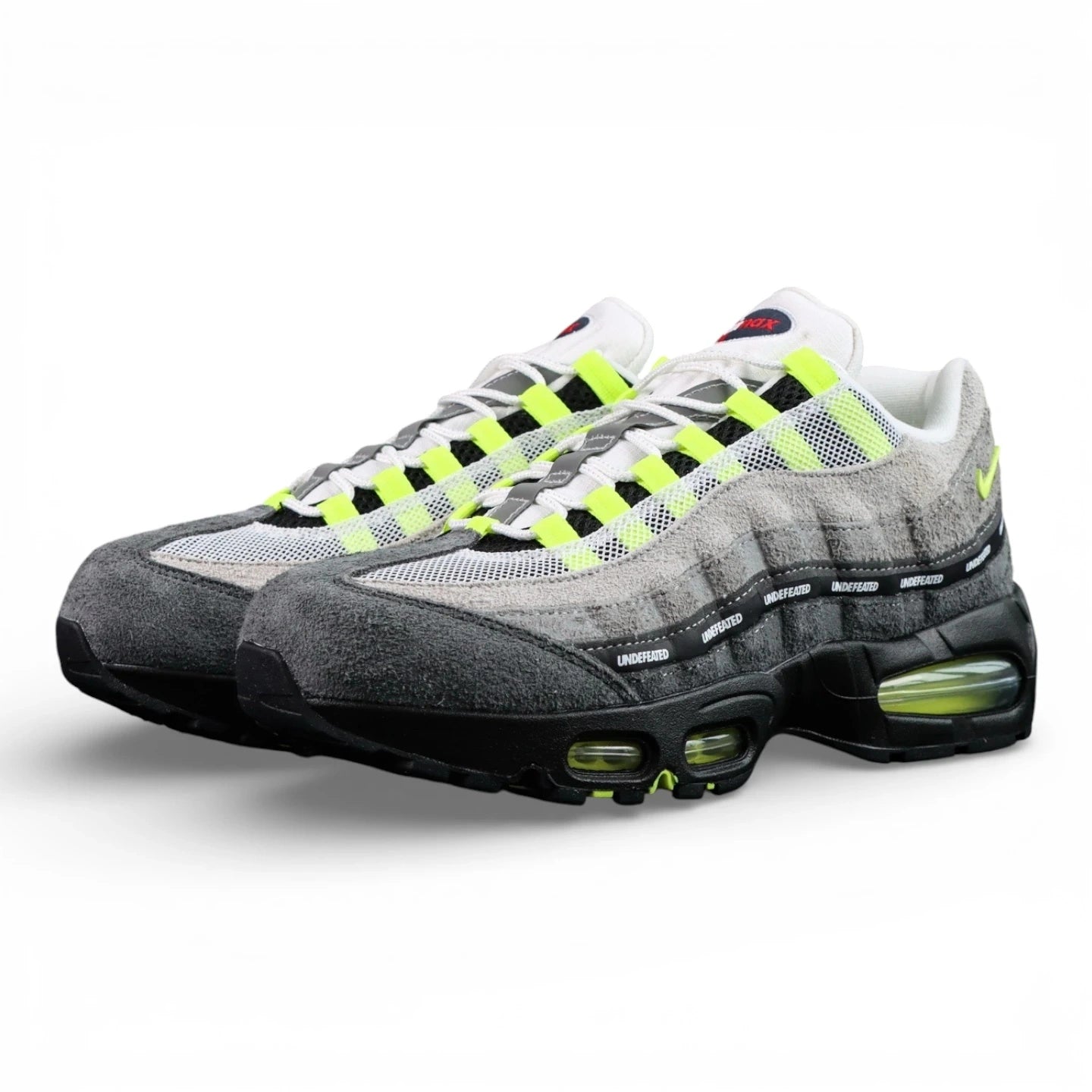 Undefeated x Air Max 95 Geo Exclusive NYC Neon 2025 — front three-quarter view