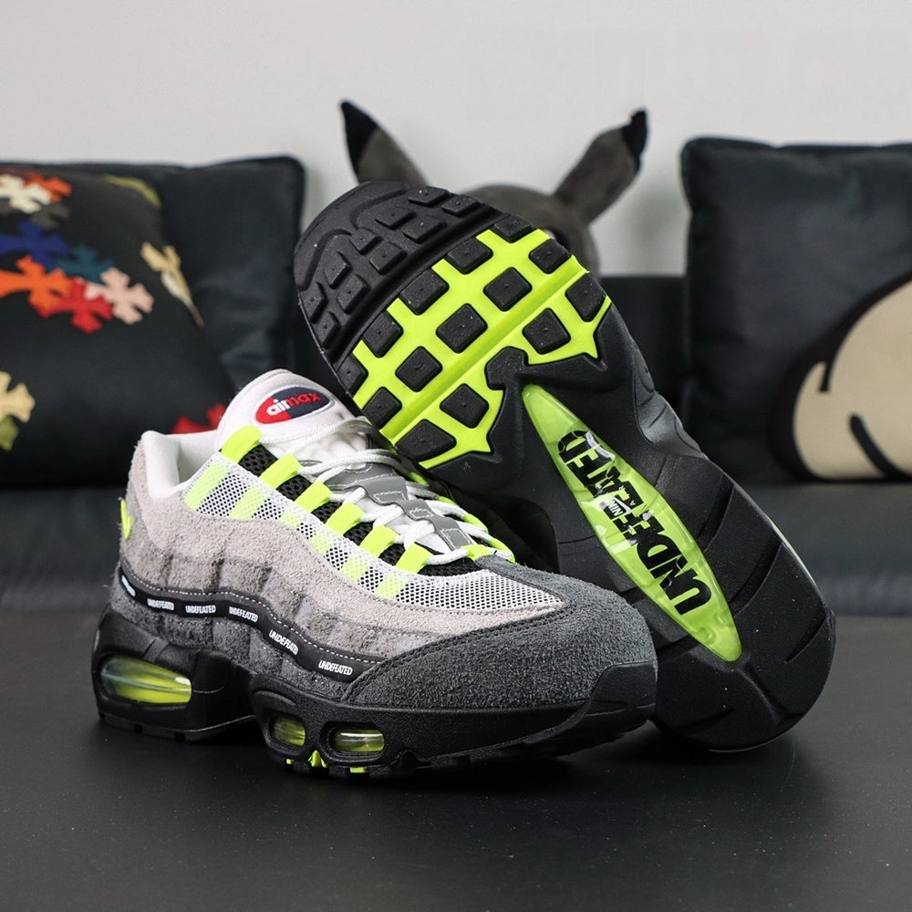 Undefeated x Air Max 95 Geo Exclusive NYC Neon 2025 — heel close-up pair