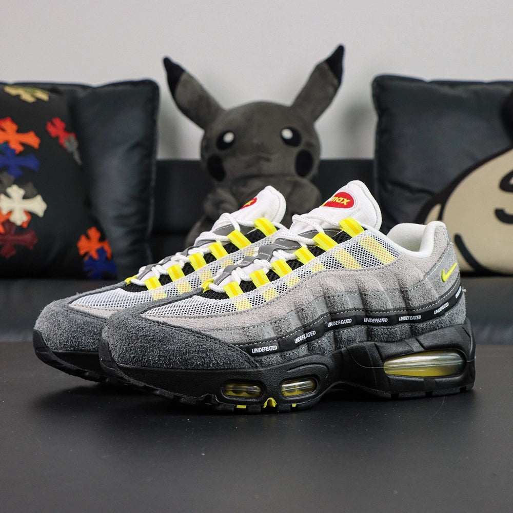 Undefeated x Air Max 95 Yellow 2025 — heel pair view