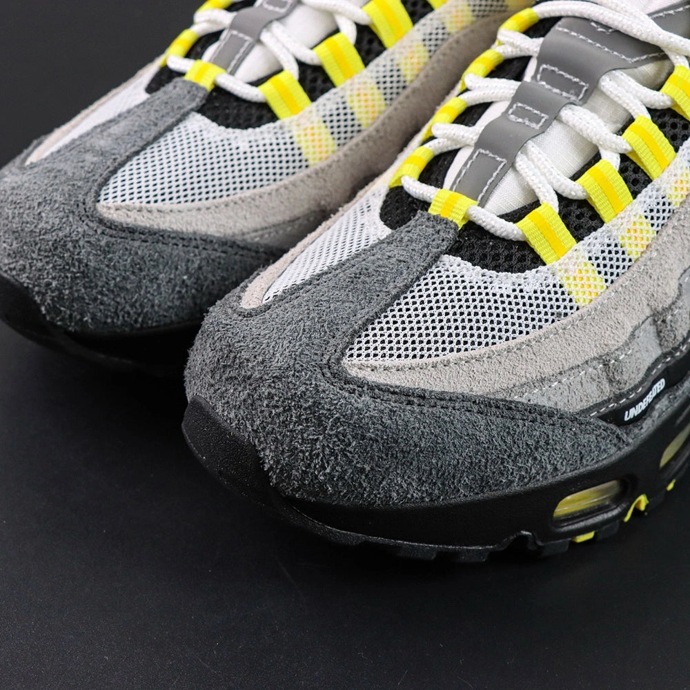 Undefeated x Air Max 95 Yellow 2025 — medial single shoe view
