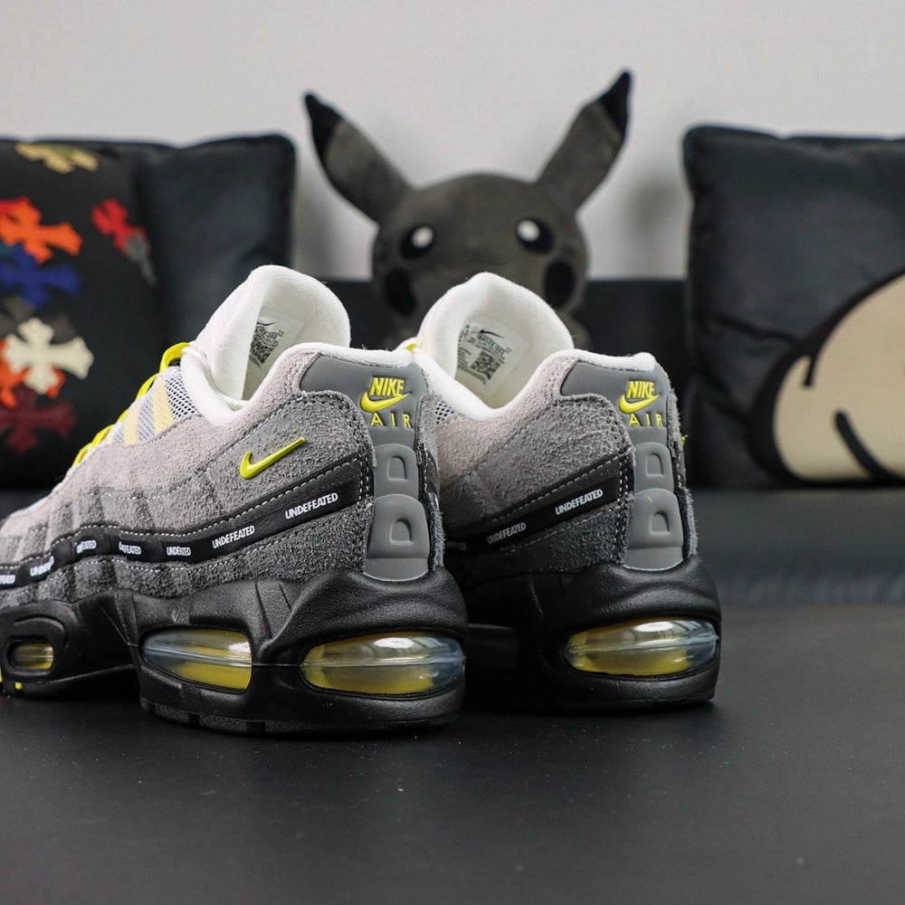 Undefeated x Air Max 95 Yellow 2025 — top-down tongue and insole detail