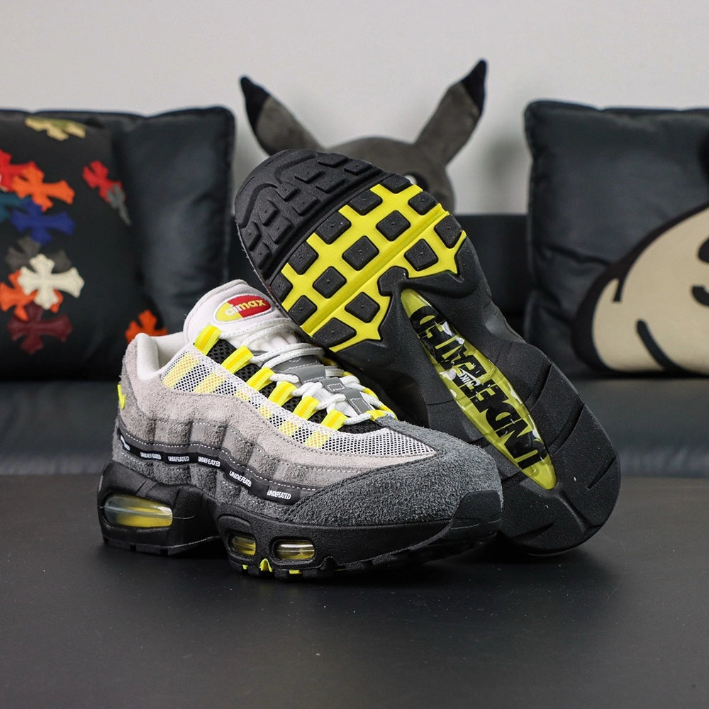 Undefeated x Air Max 95 Yellow 2025 — midsole UNDEFEATED ribbon detail