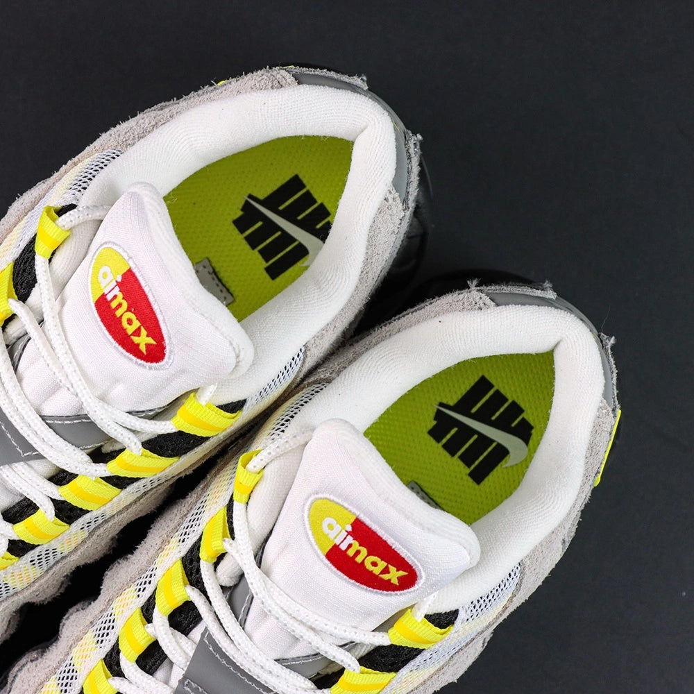 Undefeated x Air Max 95 Yellow 2025 — outsole volt traction grid view