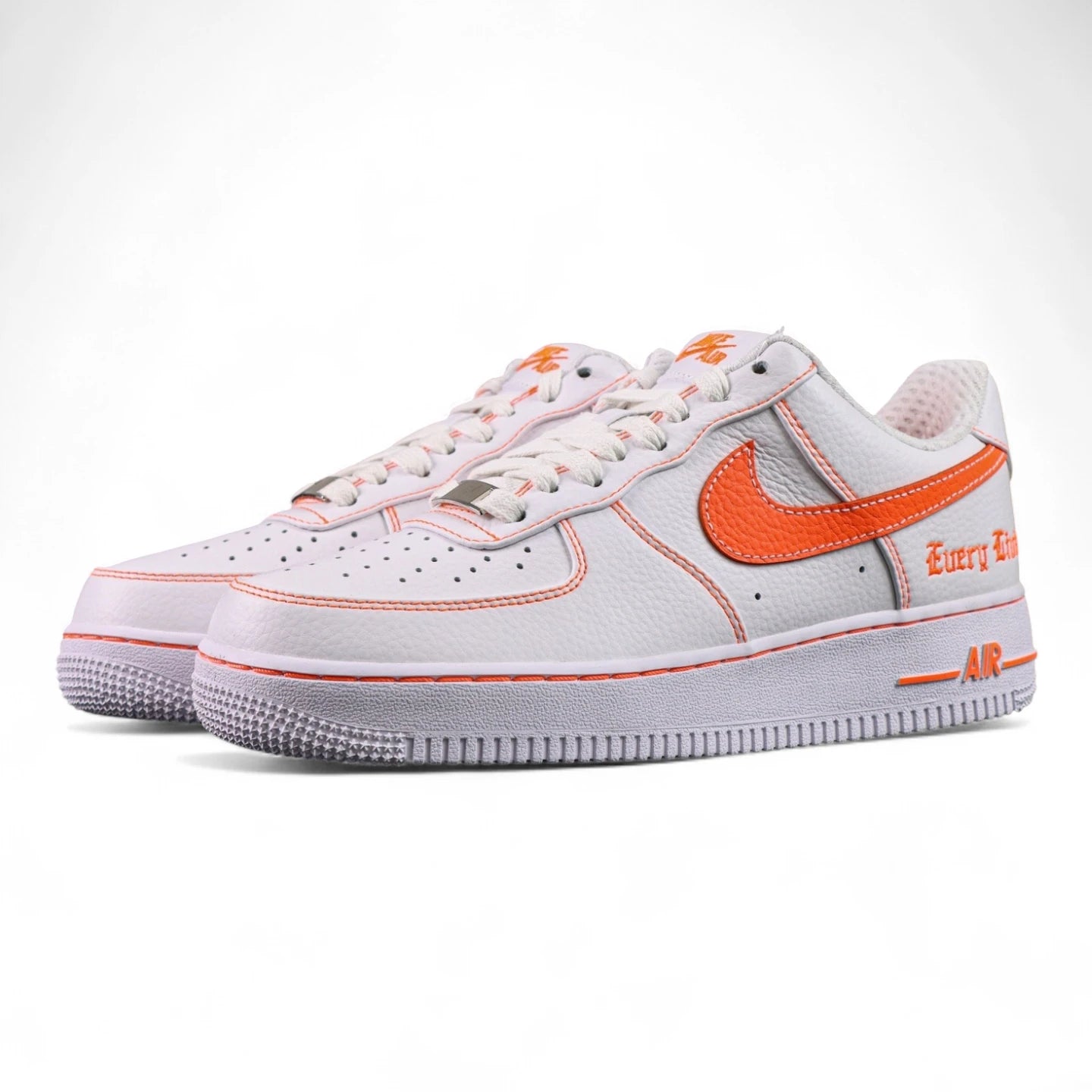 Vlone x NikeLab Air Force 1 Vlone White - pair three quarter front view white leather orange pebbled Swoosh orange stitching Pikachu