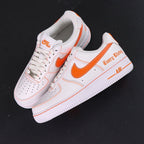 Vlone x NikeLab Air Force 1 Vlone White - pair three quarter view white background orange Swoosh Every Living gothic text AIR midsole