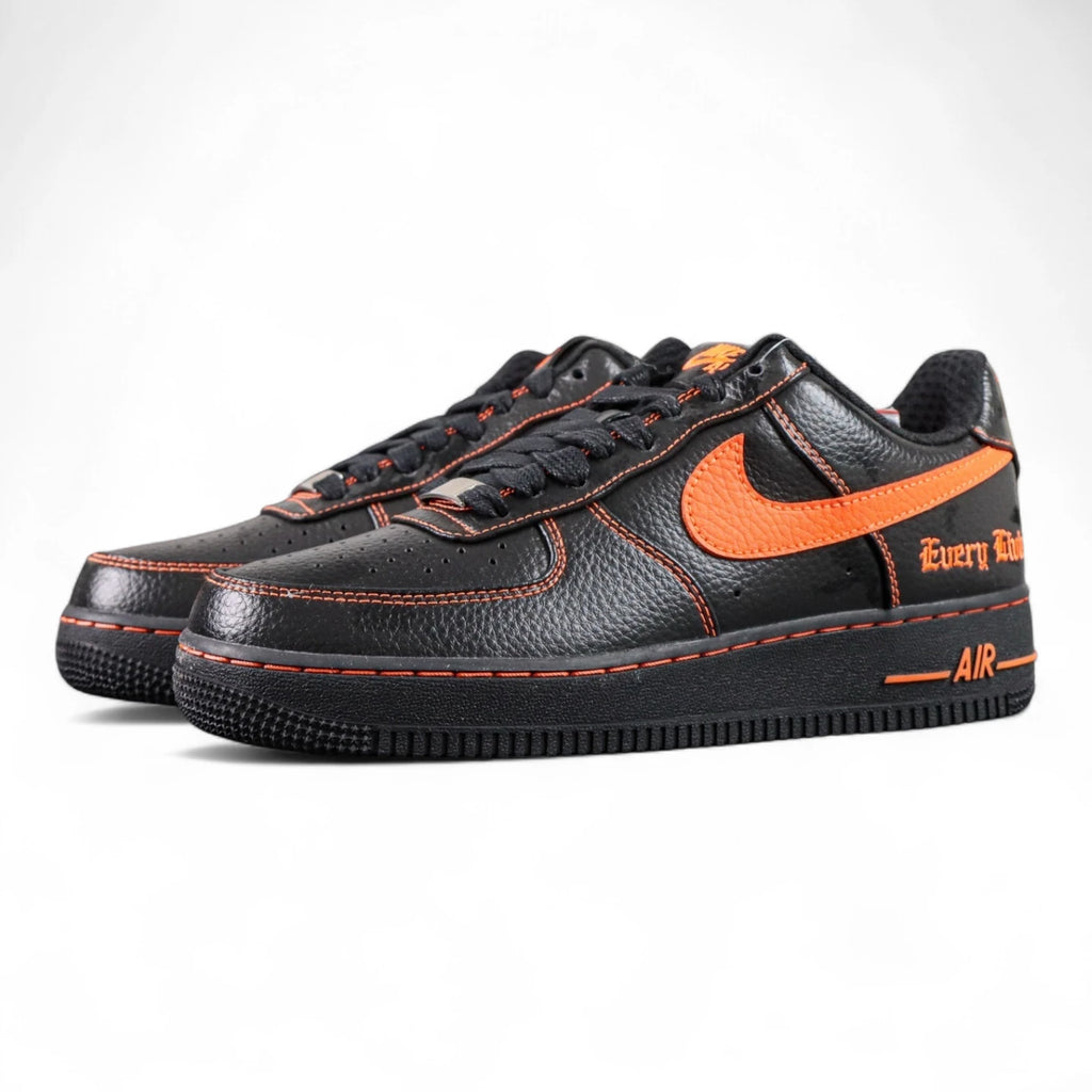Vlone x NikeLab Air Force 1 Vlone - pair three quarter front view black leather orange Swoosh orange stitching Pikachu