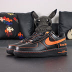 Vlone x NikeLab Air Force 1 Vlone - pair rear view orange V Vlone embroidery gothic text close up Pikachu