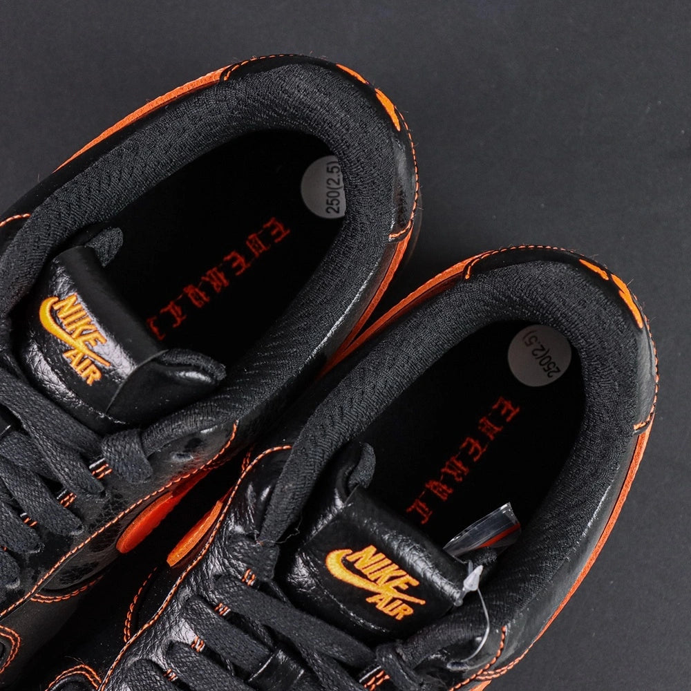 Vlone x NikeLab Air Force 1 Vlone - single shoe lateral profile orange Swoosh Crea gothic text Pikachu