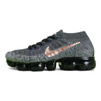 WMNS Air Vapormax Flyknit Explorer Dark — heel three-quarter view with rose gold Swoosh