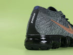 WMNS Air Vapormax Flyknit Explorer Dark — tongue NK Vapormax label close-up