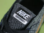 WMNS Air Vapormax Flyknit Explorer Dark — heel pair view