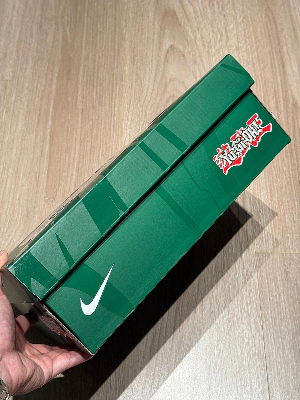 Yu-Gi-Oh x Air Max Muscle 95 QS Joey 2025 — special edition green box side with Swoosh and Yu-Gi-Oh logo