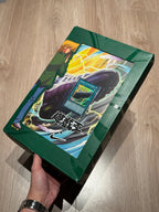 Yu-Gi-Oh x Air Max Muscle 95 QS Joey 2025 — box lid with Joey Wheeler anime artwork and Winds of Victory promo card