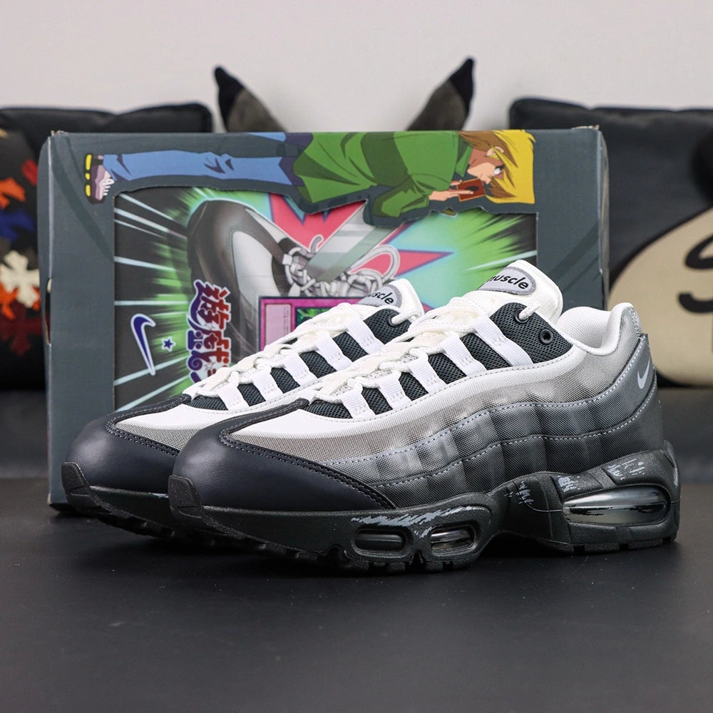Yu-Gi-Oh x Air Max Muscle 95 QS Jonouchi 2025 — front three-quarter pair lifestyle view