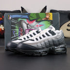 Yu-Gi-Oh x Air Max Muscle 95 QS Jonouchi 2025 — front three-quarter pair lifestyle view