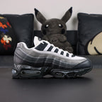 Yu-Gi-Oh x Air Max Muscle 95 QS Jonouchi 2025 — toe box close-up navy leather and grey mesh